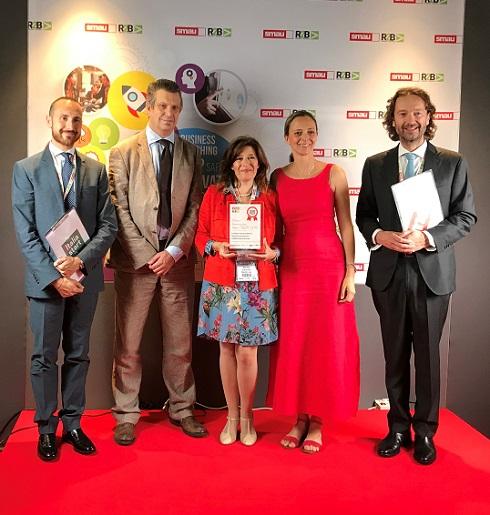 Baxter employees receiving SMAU Technological Innovation Award